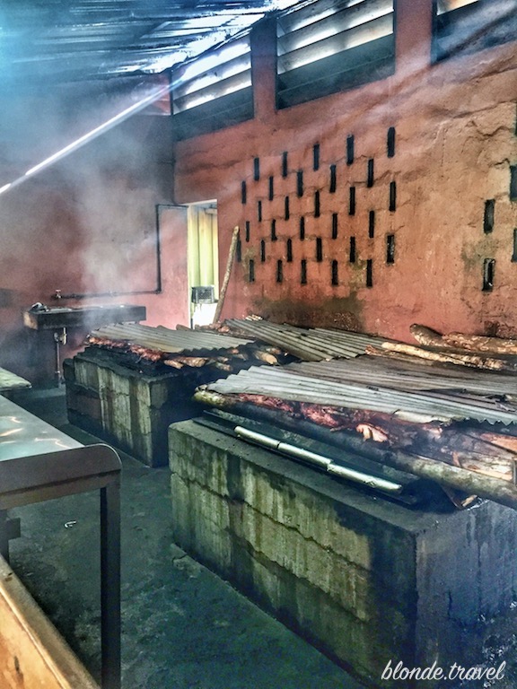 Traditional Jamaican jerk chicken cooking