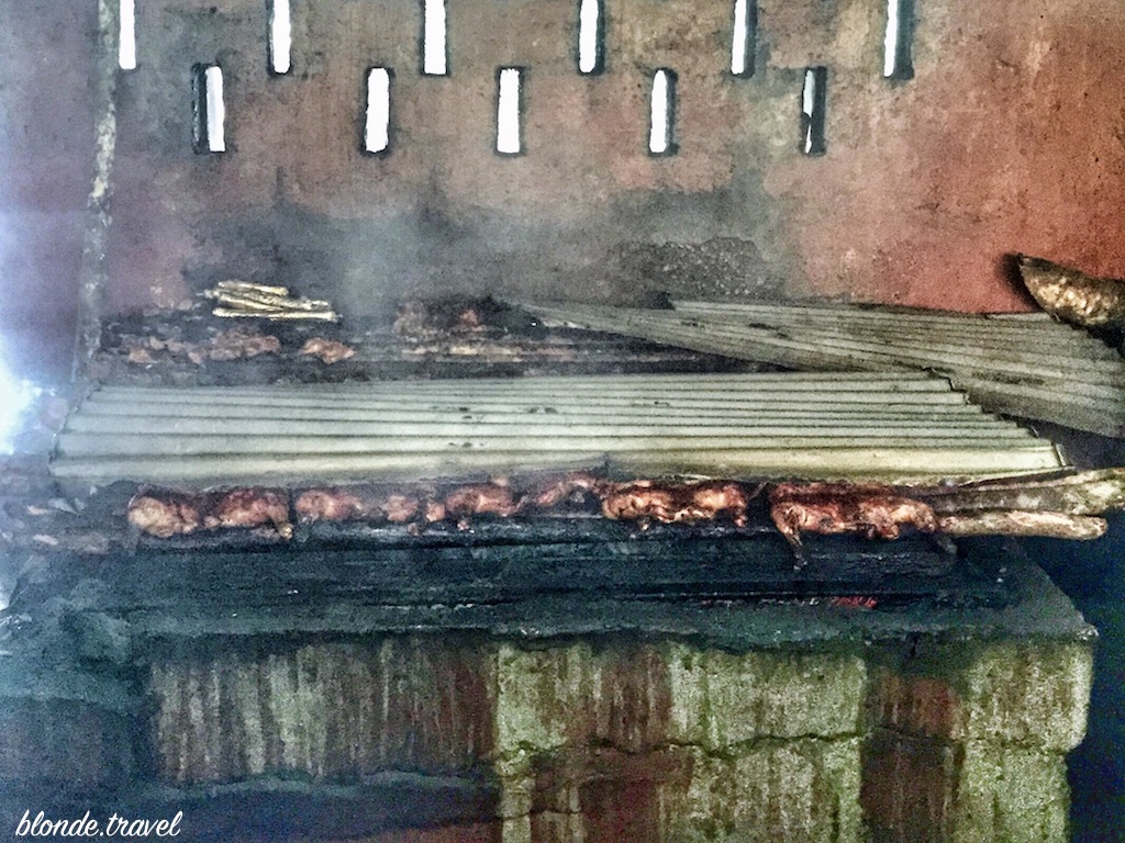 Jerk meat cooking over pimento wood