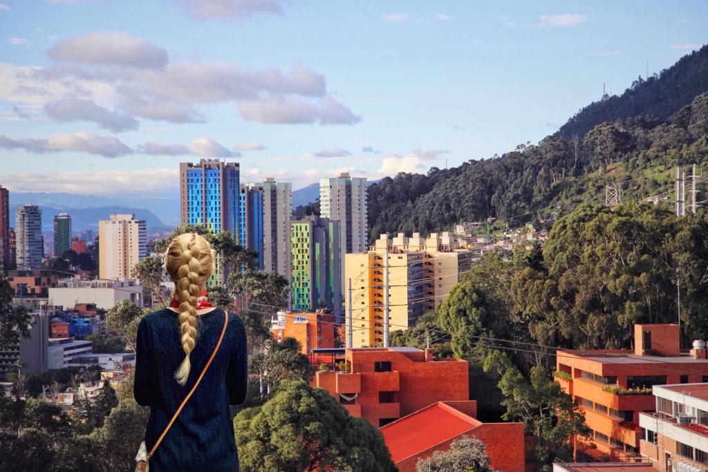 A traveler looking across Bogotá from the surrounding hills