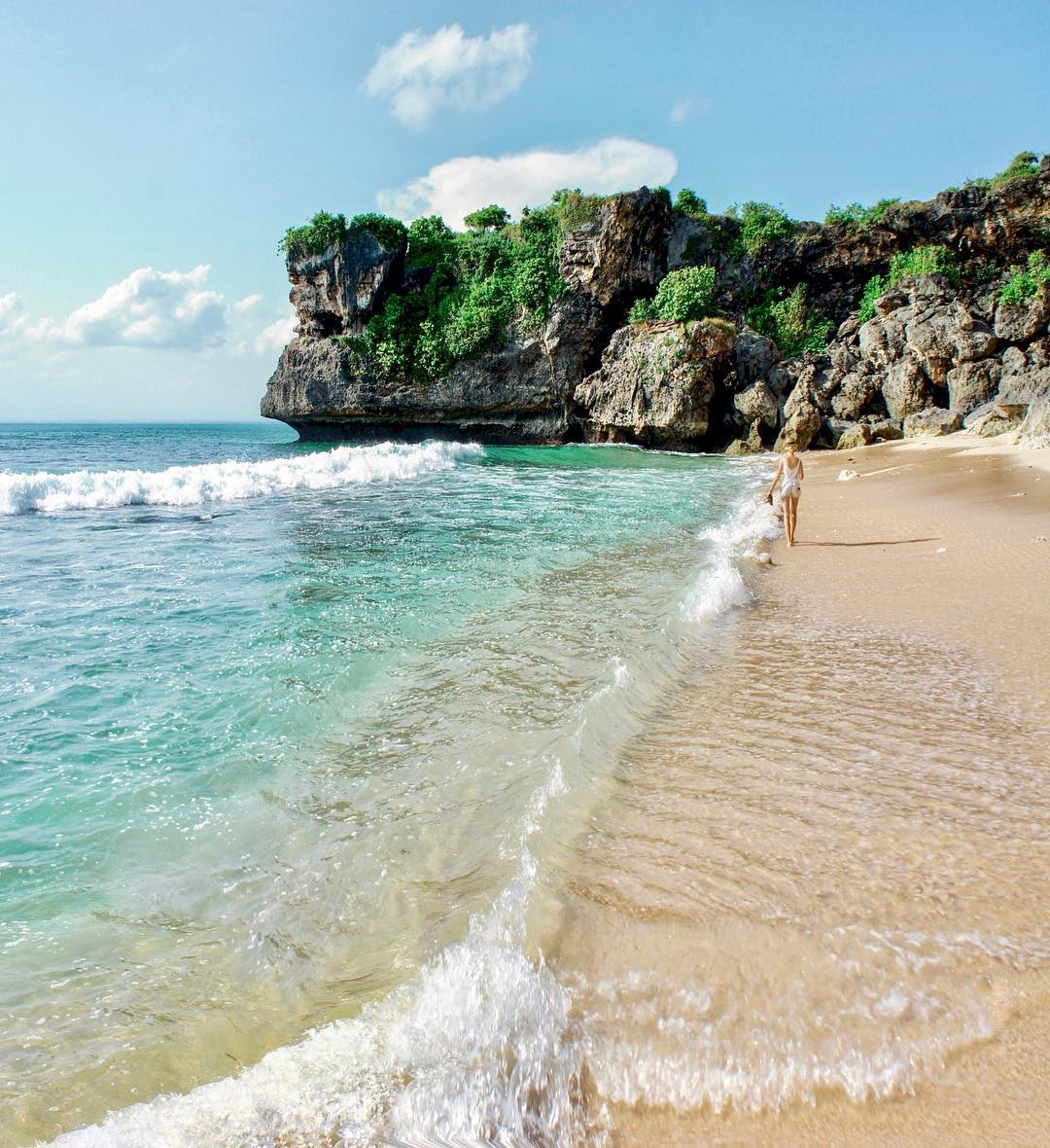 A quiet curve of sand and turquoise water at Balangan Beach in Bali.