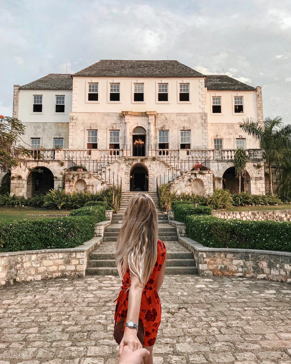 Olga approaching the stone steps of Rose Hall Great House in Jamaica.