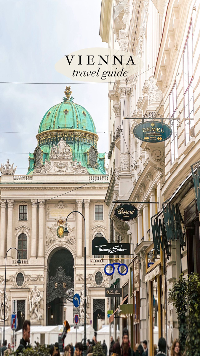 An ornate historic façade and café frontage in Vienna.