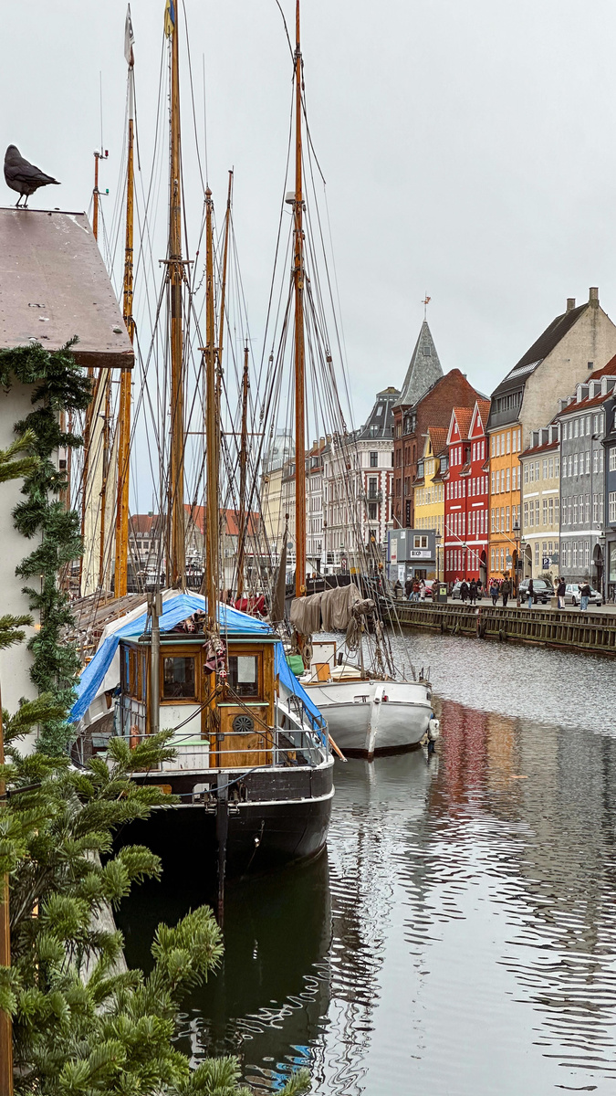 Boats moored beside Nyhavn’s colourful waterfront in Copenhagen.