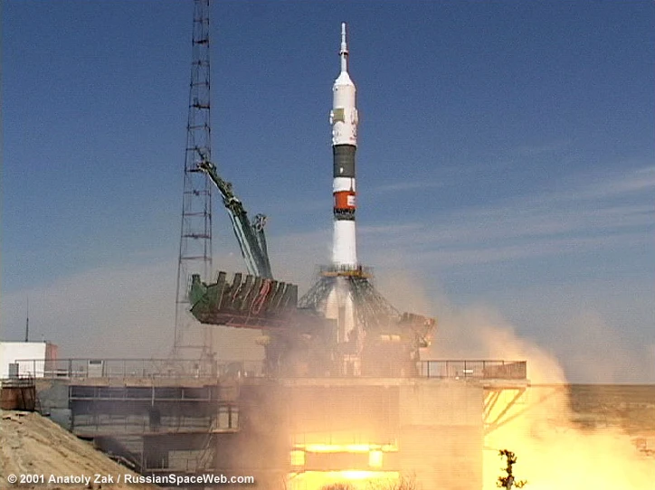 Soyuz TM-32 rises from its launch pad at Baikonur on 28 April 2001 in a cloud of exhaust.