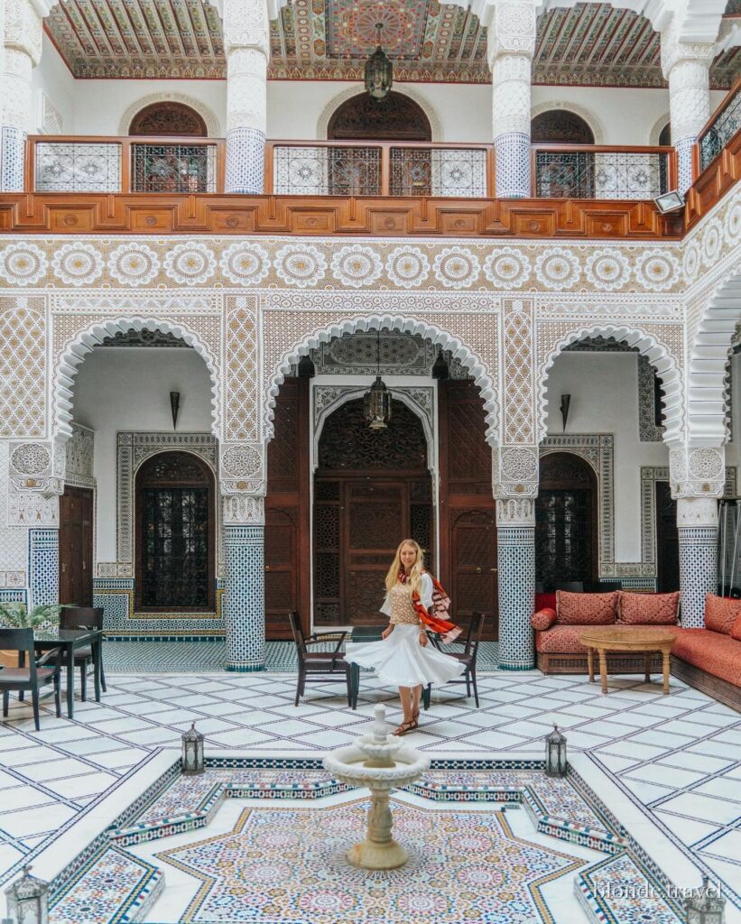 The tiled courtyard and central fountain at Riad Batchisarai in Fez.