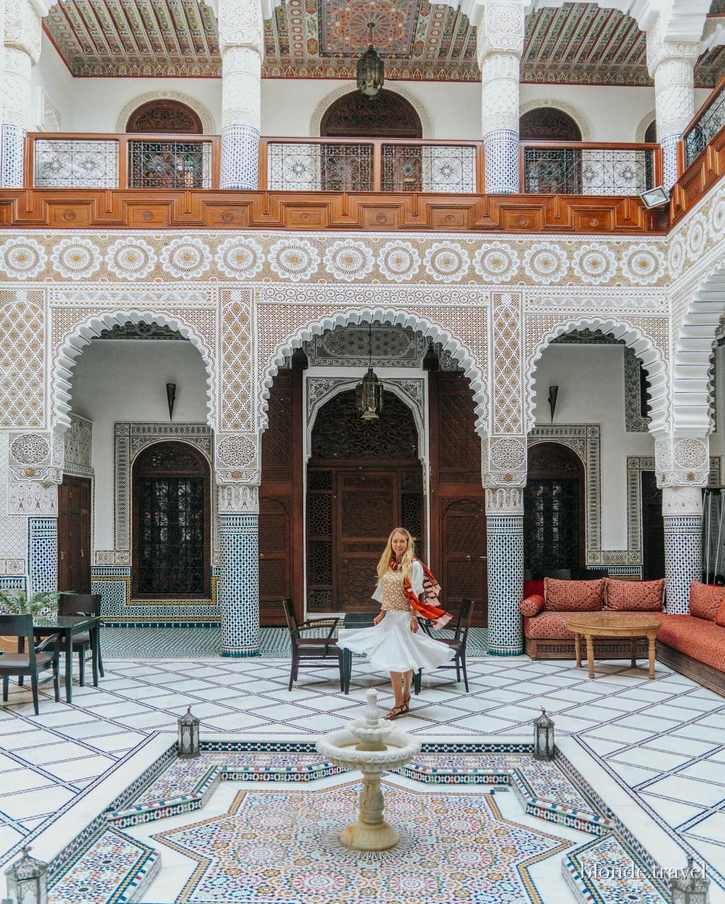 The tiled courtyard and central fountain at Riad Batchisarai in Fez.