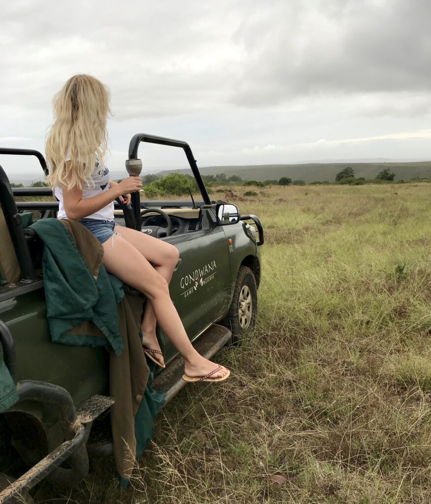 Olga sitting in an open safari vehicle before a game drive at Gondwana Game Reserve