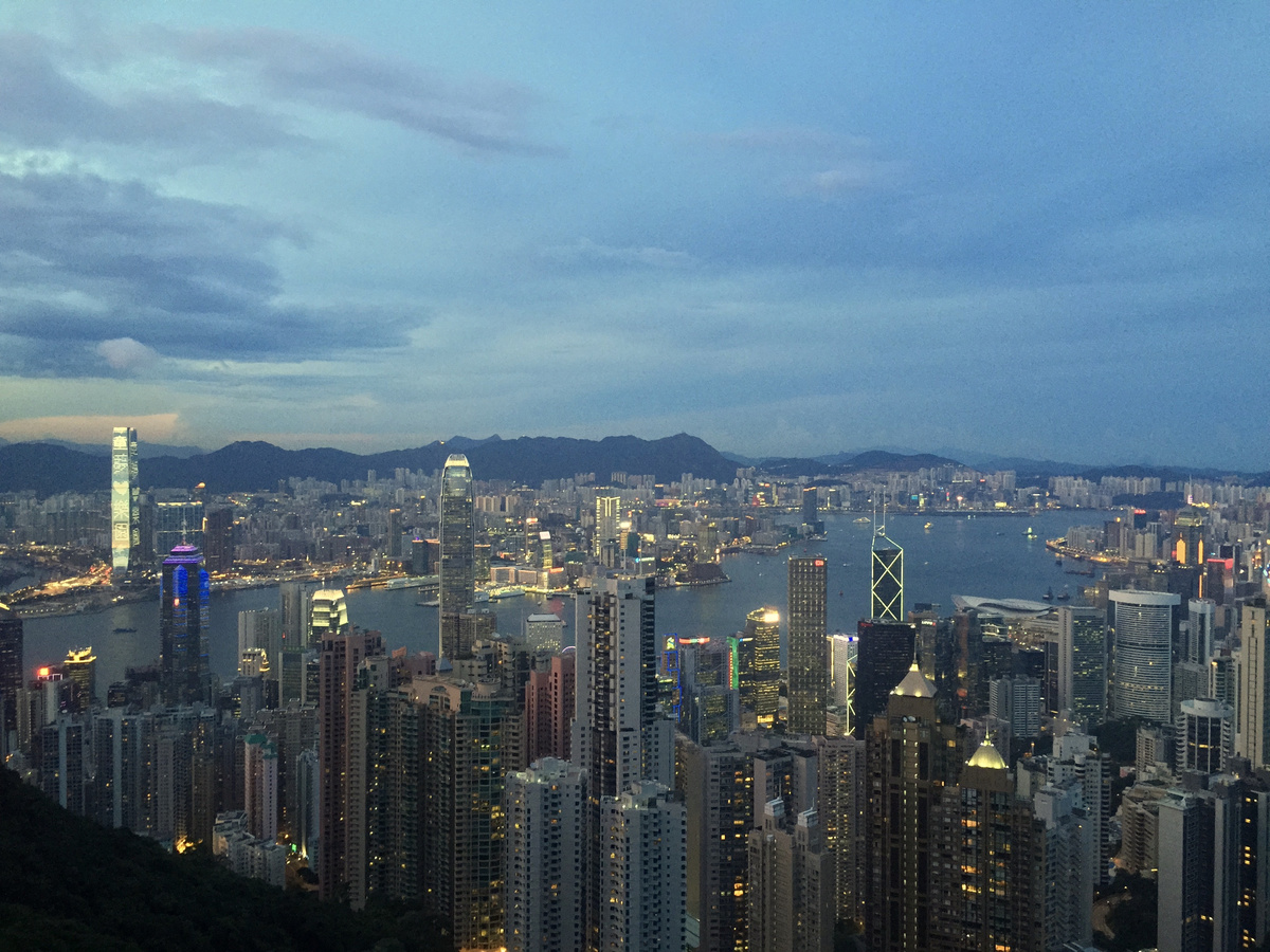 Hong Kong skyline and Victoria Harbour at blue hour, viewed from Victoria Peak