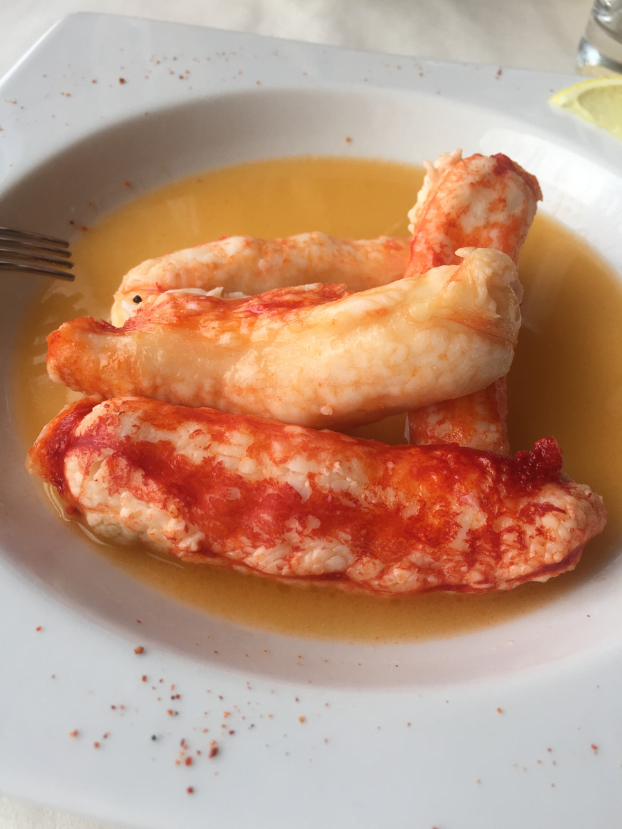 Large pieces of Kamchatka crab served in broth at the North Adventures hotel restaurant