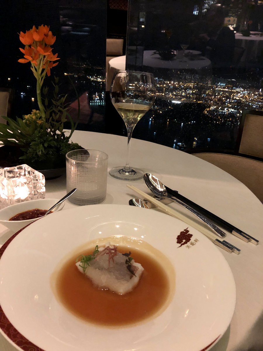 A Cantonese dinner course, white wine and Kowloon lights at Tin Lung Heen
