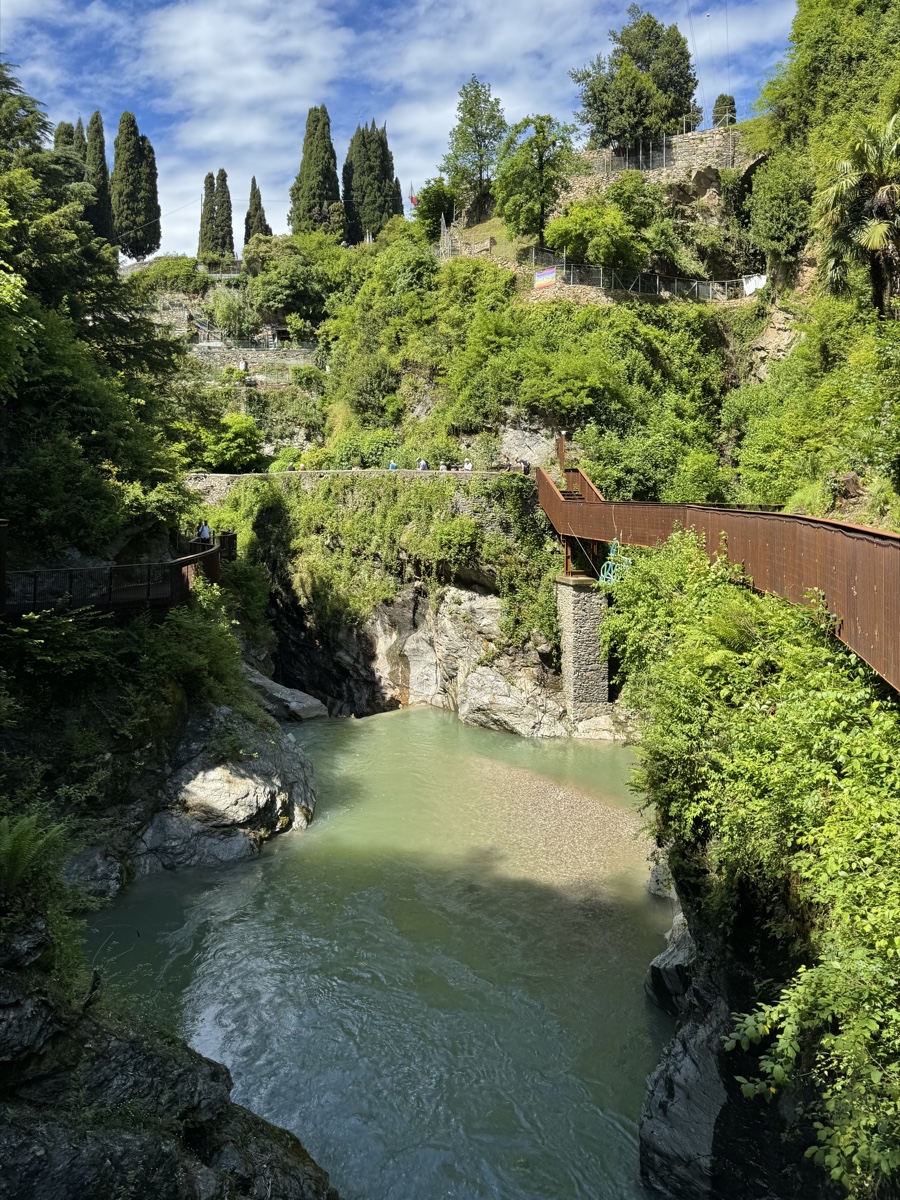 Walkways cross the rocky, green gorge at Orrido di Bellano.