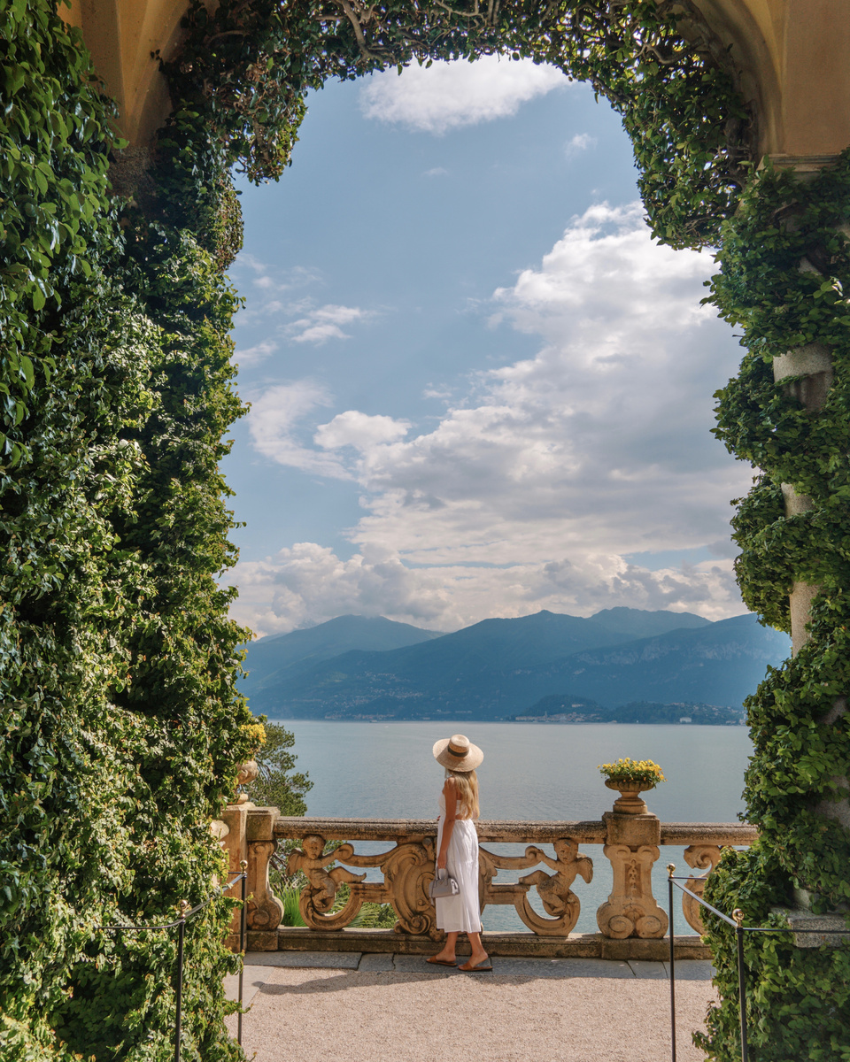 Olga looks across Lake Como from the ivy-framed loggia at Villa del Balbianello.