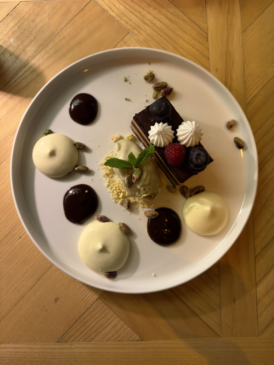 Chocolate and plum dessert with ice cream at Bled Castle Restaurant.