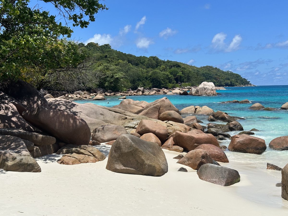 Granite boulders and turquoise water at Anse Lazio on Praslin.