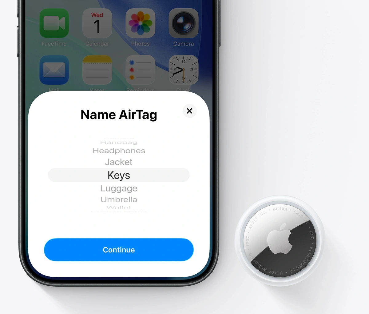 An iPhone displaying the Name AirTag setup screen beside an AirTag.