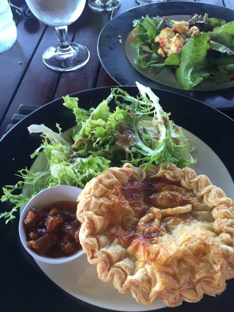 A pastry-topped pie with salad and chutney at Batu Karang Lembongan.