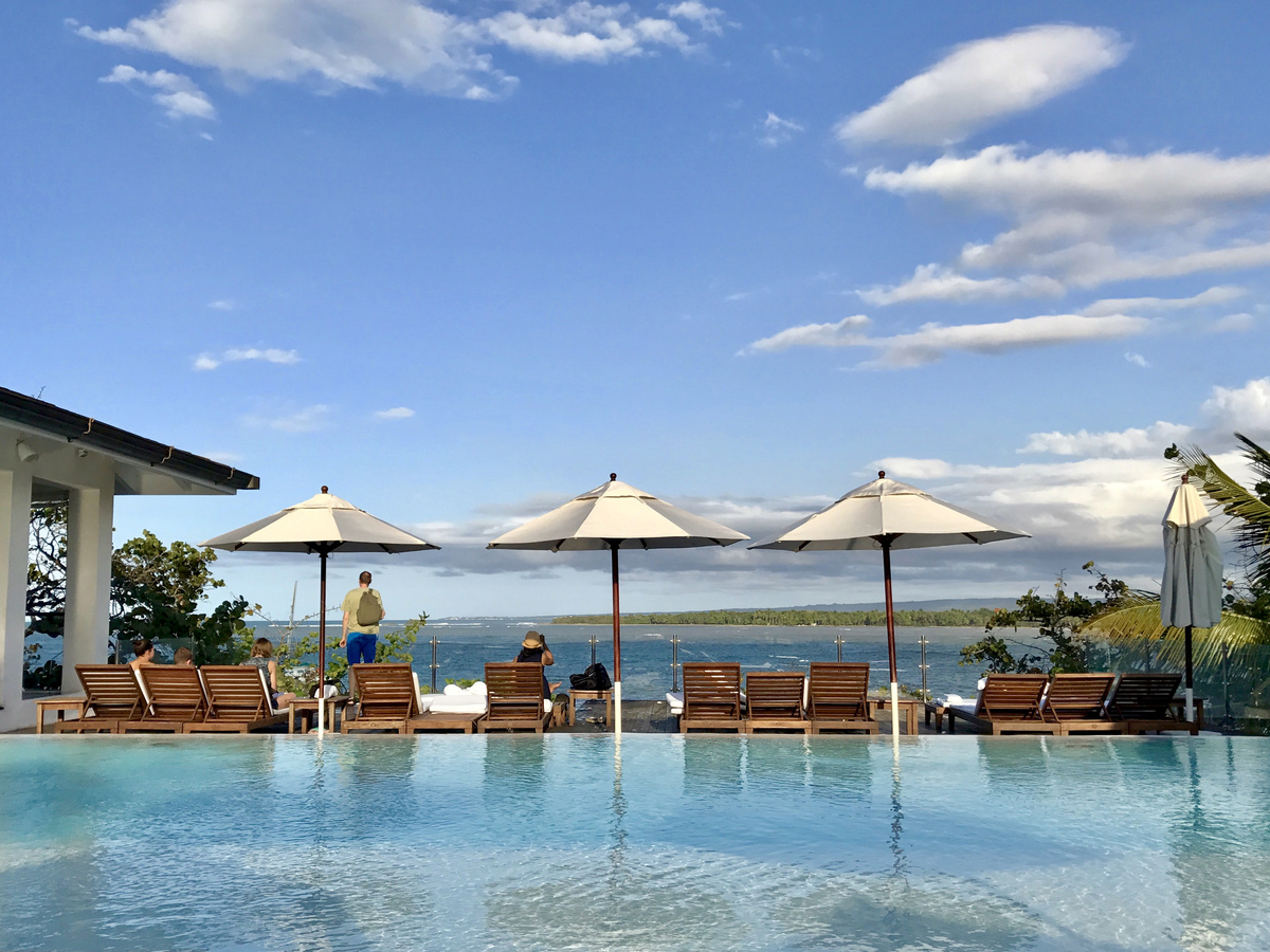 Rooftop swimming pool and sun loungers facing the Atlantic