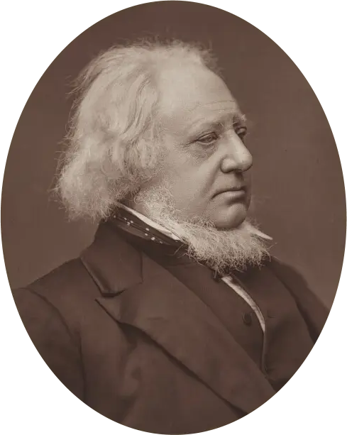 Oval photograph of Henry Cole in profile, with wispy white hair, a white chin-fringe beard and a dark coat.