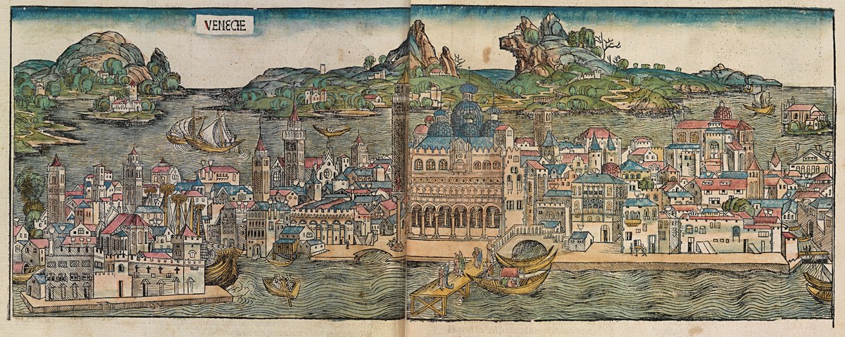 A long, hand-coloured woodcut panorama of Venice seen from the lagoon, with domes, towers and ships in the foreground.