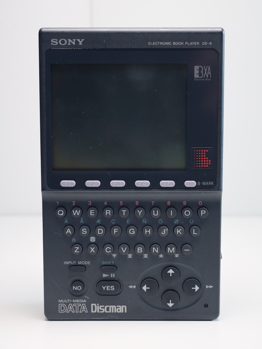 A grey Sony Data Discman electronic book player with a small screen above a compact keyboard.