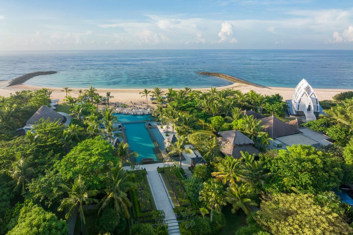 Aerial view of The Ritz-Carlton, Bali, showing the pool, gardens, beachfront and wedding chapel; courtesy of Ritz Carlton
