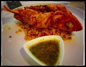 A plated fish dish at Café SBG.