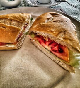 A filled baguette cut in half at Dalia’s Café & Bakery.
