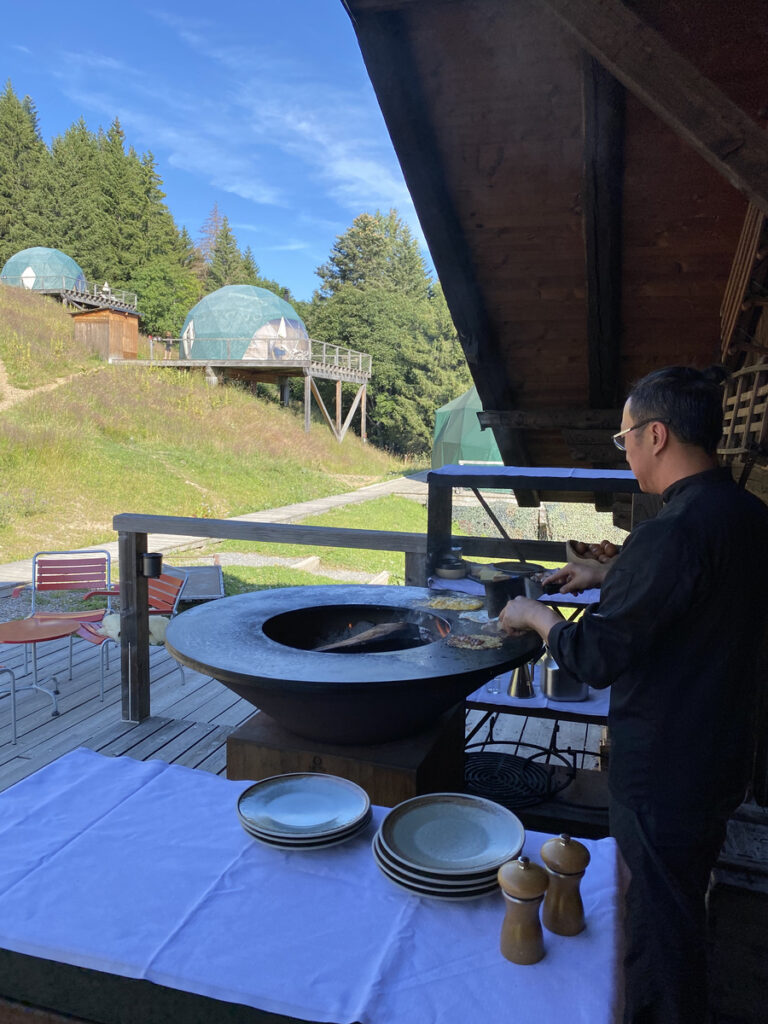 Breakfast being prepared beside an OFYR on the Pod-house terrace.