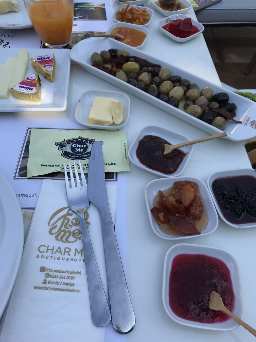 A close view of olives, preserves and cheese at Char Me’s garden breakfast.