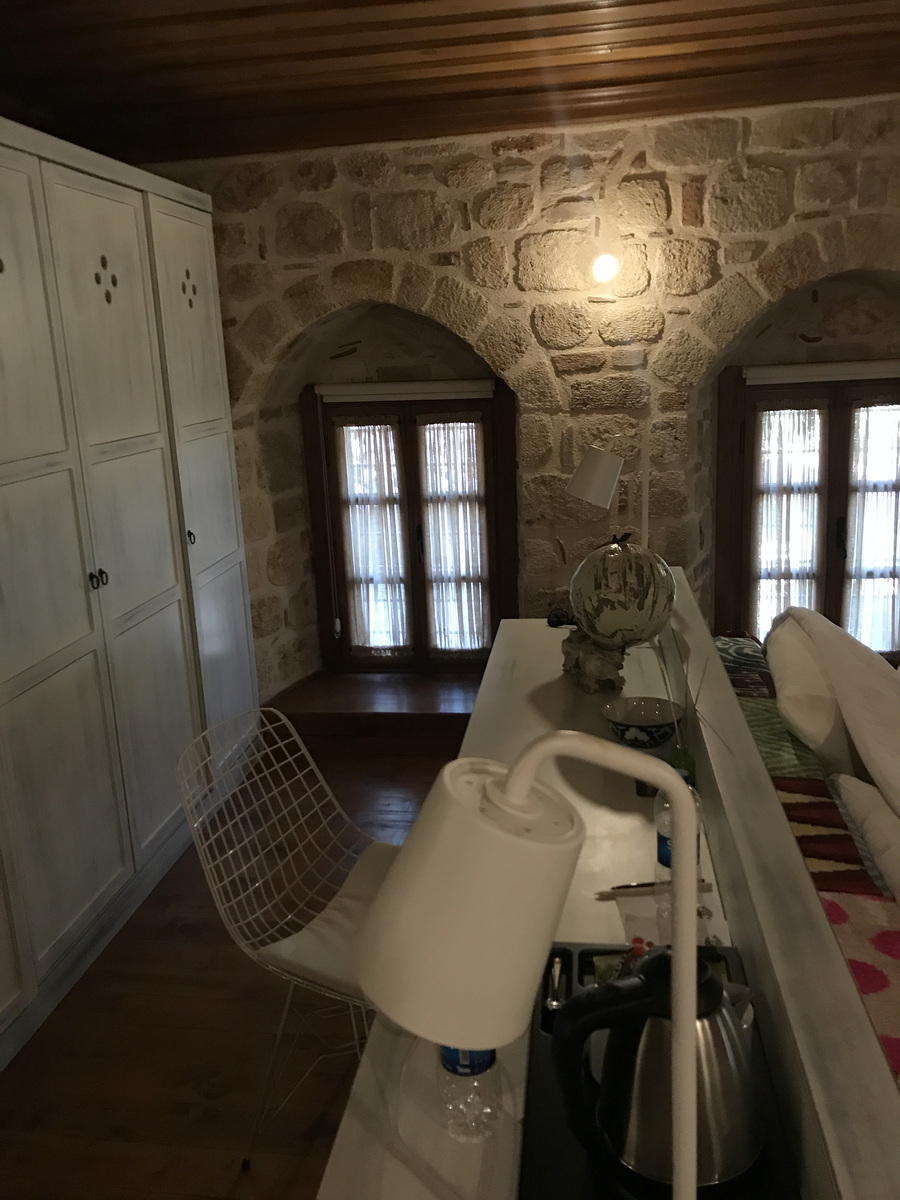 The writing table, arched windows and kettle in our Char Me Deluxe Room.